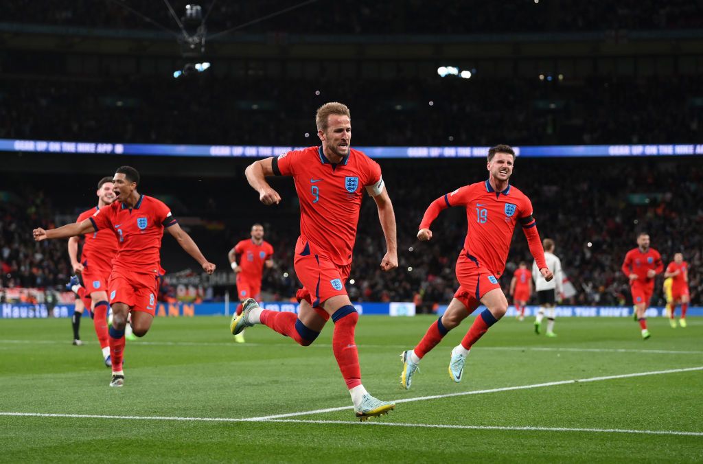 England&#039;s World Cup squad: Harry Kane of England celebrates with team mates Mason Mount and Jude Bellingham after scoring their team&#039;s third goal from the penalty spot during the UEFA Nations League League A Group 3 match between England and Germany at Wembley Stadium on September 26, 2022 in London, England.