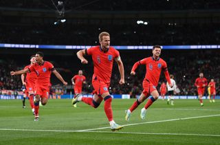England's World Cup squad: Harry Kane of England celebrates with team mates Mason Mount and Jude Bellingham after scoring their team's third goal from the penalty spot during the UEFA Nations League League A Group 3 match between England and Germany at Wembley Stadium on September 26, 2022 in London, England.