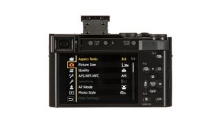 Panasonic Lumix TZ200 rear view showing menus on LCD screen on white background