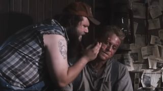 Tyler Labine tends to Alan Tudyk's wasp stings in Tucker and Dale vs. Evil.