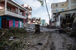 Damage to houses in Roseau, on the Caribbean island of Dominica, can be seen on Sept. 21.