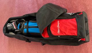 MacGregor VIP II Premium Travel Cover with our golf bag zipped up inside of it