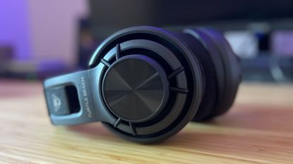 Turtle Beach Atlas Air gaming headset on its side showing floating cup design