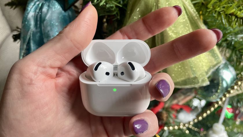 AirPods 4 and AirPods Pro 2, held together to show the differences