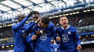 Chelsea players celebrate with teammate Wesley Fofana after he scored their side's goal during the Premier League match between Chelsea and Leeds United at Stamford Bridge on 4 March, 2023 in London, United Kingdom.
