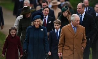 King Charles, Queen Camilla, Princess Charlotte, Prince George, Kate Middleton, Princess Beatrice and Prince William all wearing coats and walking to church