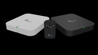 The Ampetronic | Listen Technologies Auri system in black and white. 