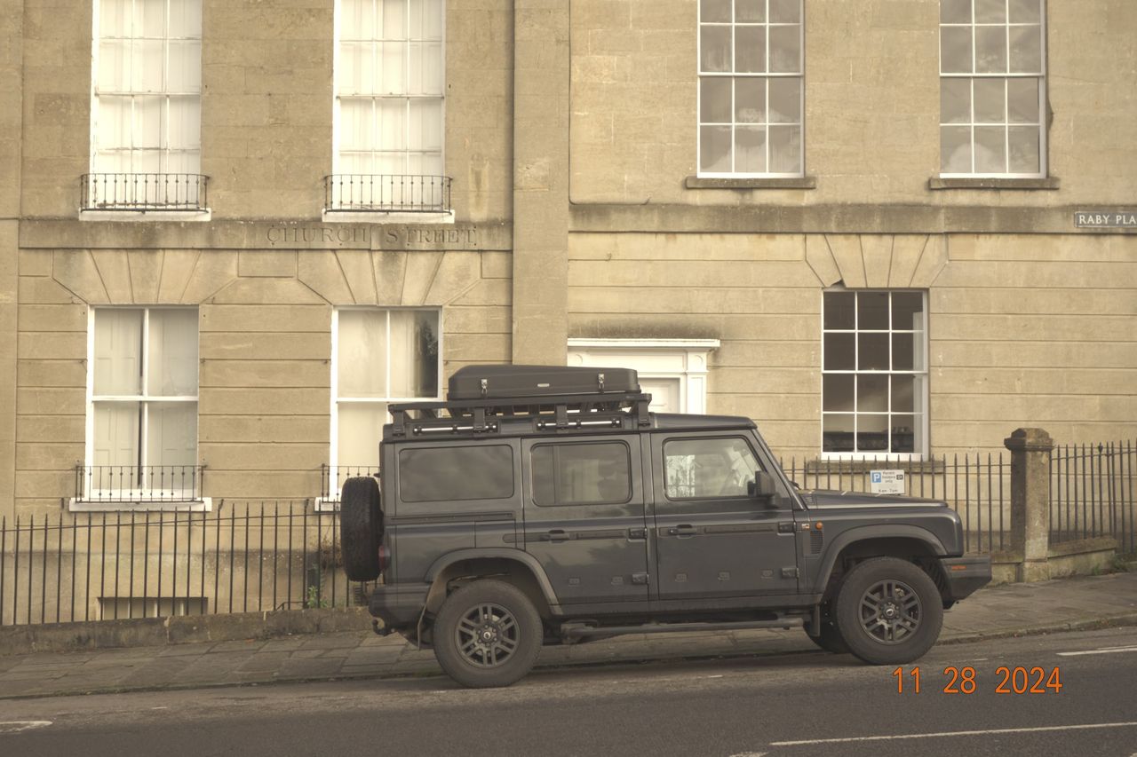 4x4 truck parked in the city of Bath, UK, with retro photo picture effect