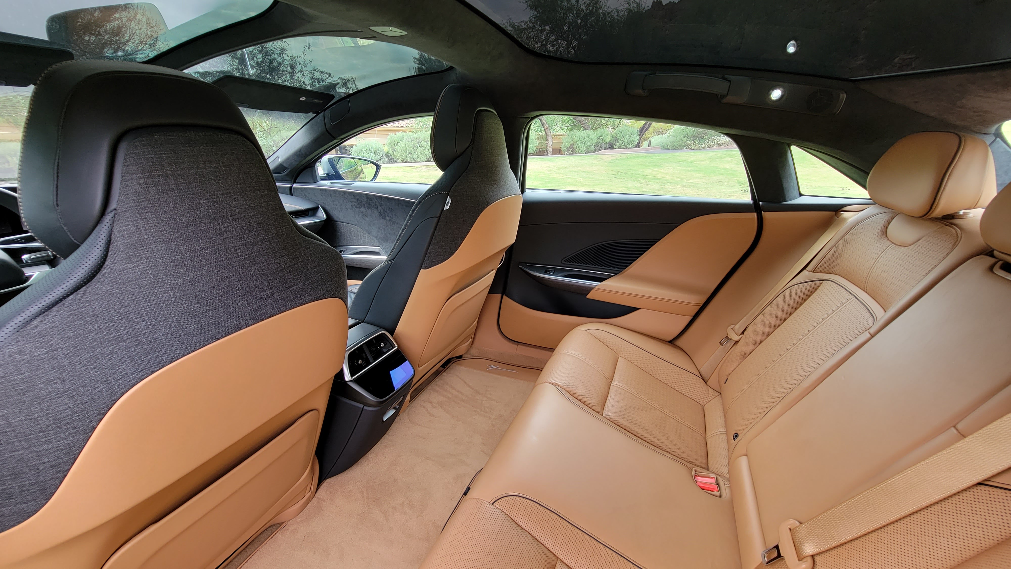 Inside the Lucid Air cabin showing front and rear seats