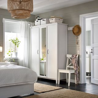 bedroom with brusali three door wardrobe