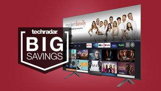 Toshiba M550 TV on red background with sign saying Big Savings