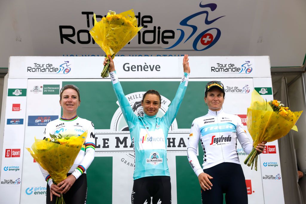 GENEVA SWITZERLAND OCTOBER 09 LR Annemiek Van Vleuten of Netherlands and Movistar Team Women on second place race winner Ashleigh Moolman Pasio of South Africa and Team SD Worx green leader jersey and Elisa Longo Borghini of Italy and Team Trek Segafredo on third place pose on the podium ceremony after the 1st Tour de Romandie Feminin 2022 Stage 3 a 1476km stage from Fribourg to Genve TDRwomen TDRF on October 09 2022 in Geneva Switzerland Photo by Bas CzerwinskiGetty Images
