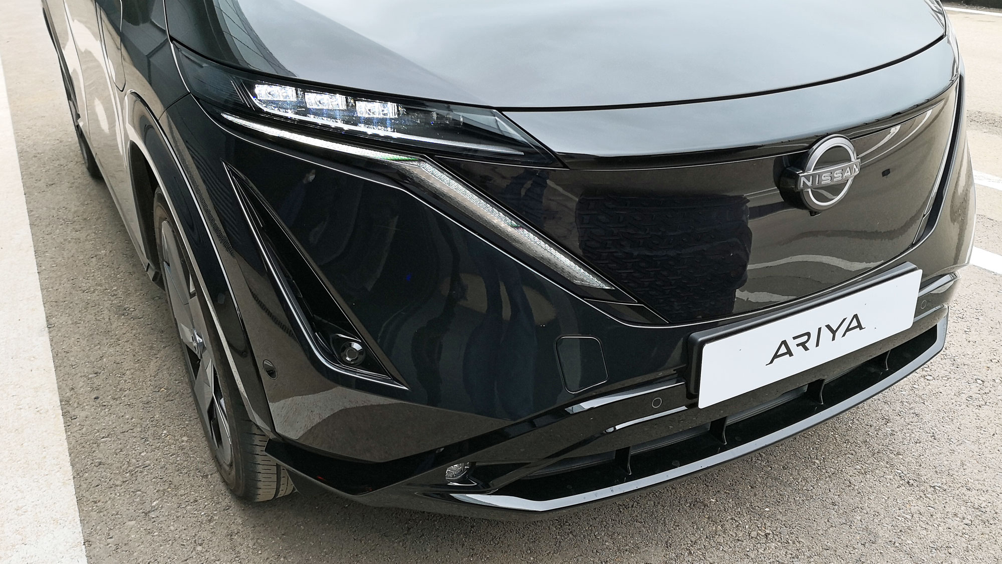 Close-up of the front of the Nissan Ariya