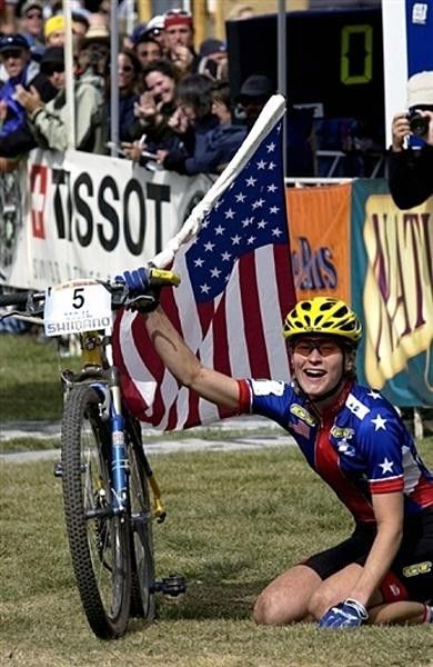 Alison Dunlap celebrates after winning the world cross country championships