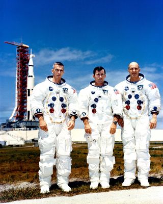 From the left, Eugene Cernan, John Young and Thomas Stafford — the Apollo 10 crew — stand at the Kennedy Space Center in front of Launch Pad 39B.