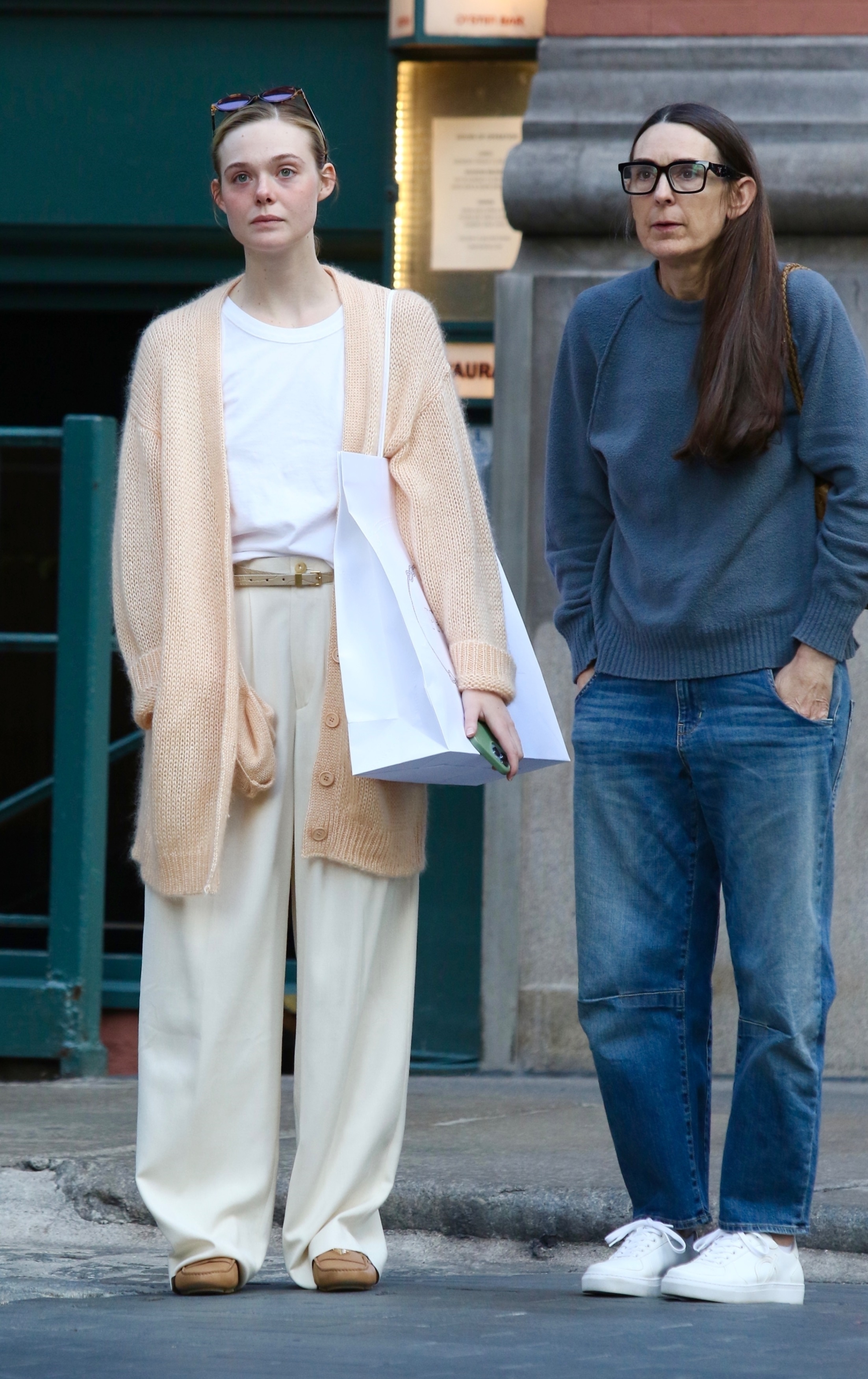 Elle Fanning wearing khaki pants in NYC
