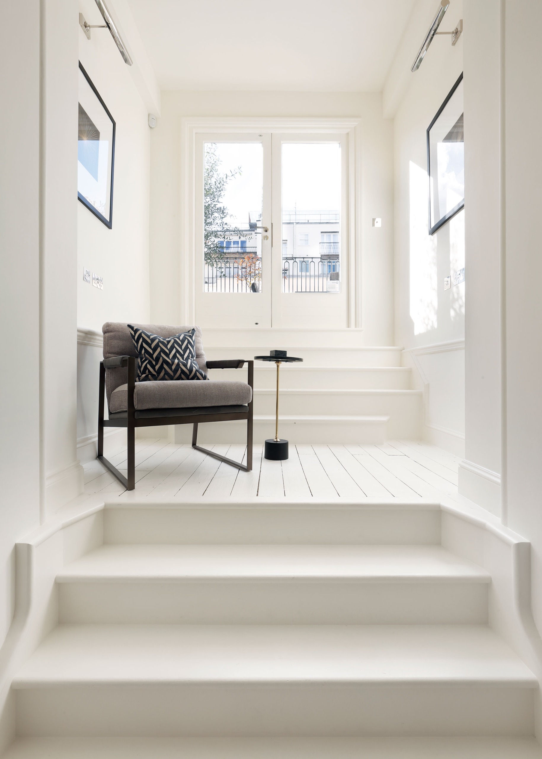 all-white reading nook up stairs