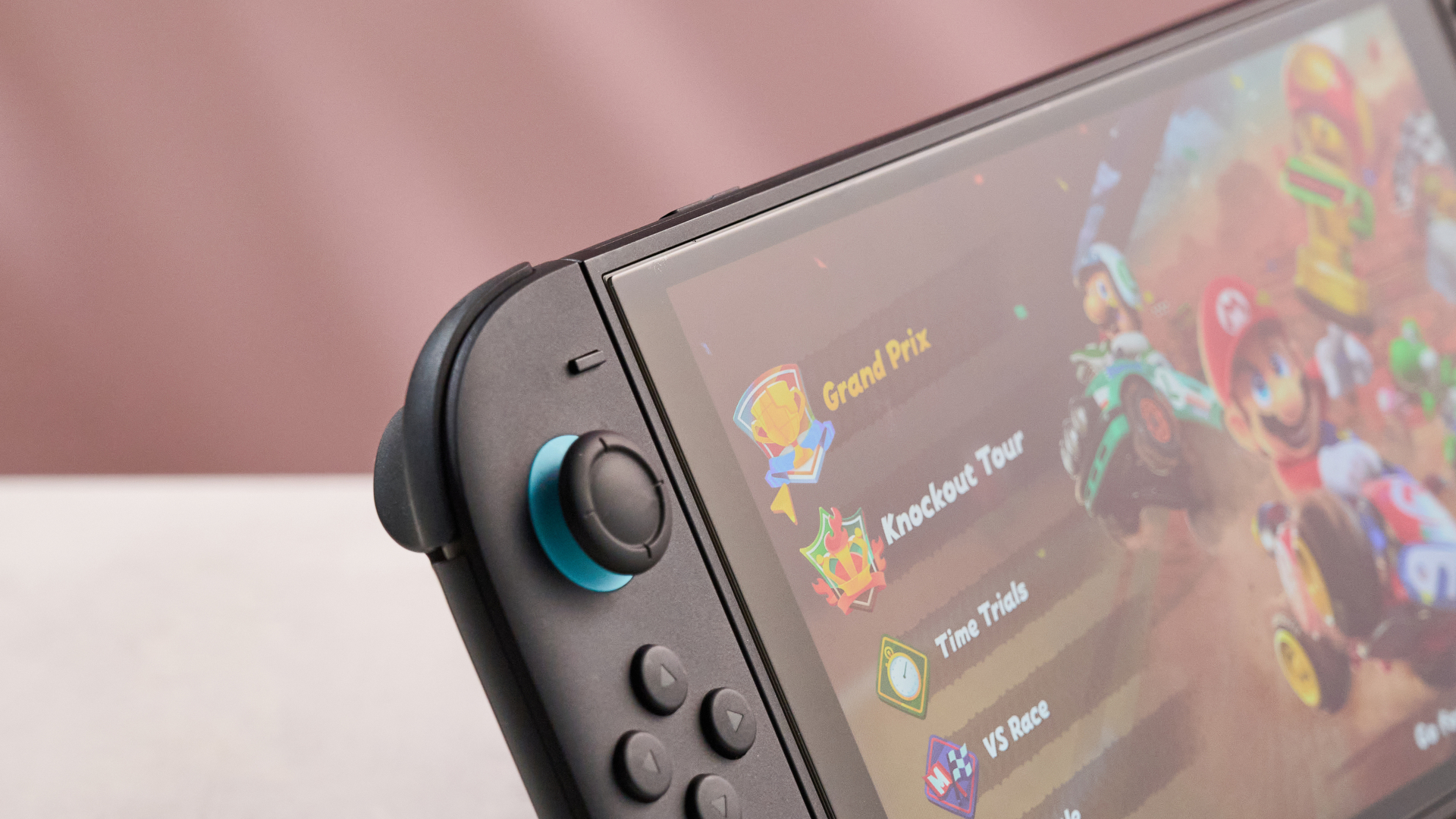 The Nintendo Switch 2 with the Belkin Tempered Glass Anti-Reflective Screen Protector applied; it's at an extreme viewing angle and yet it's easy to still see Mario Kart World loaded up on the screen.