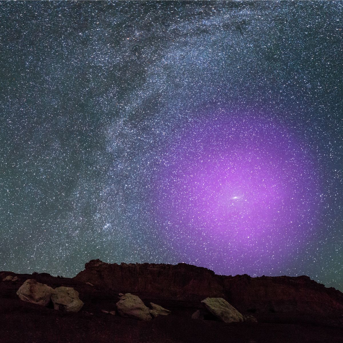 An artist&#039;s depiction showing what the Andromeda Galaxy halo would look like in the sky if our eyes could see it.