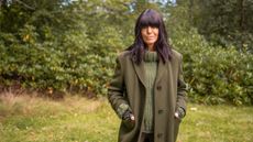 Claudia Winkleman's green jumper and coat on The Traitors series 2
