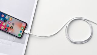 Anker Powerline Plus II, one of the best iPhone charger cables, connected to an iPhone