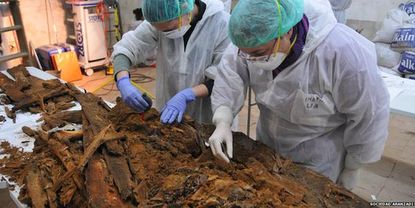 Forensic scientists analyze the remains found at the convent
