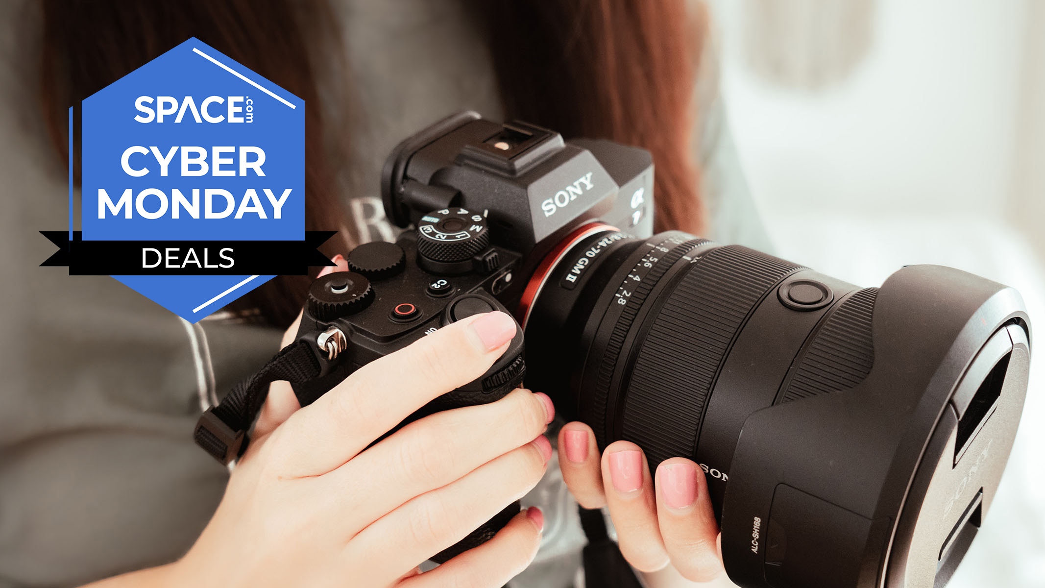 Expert Kimberley Lane holding a Sony A7R V camera. 