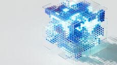 A CGI image of a tesseract, filled with glowing blue cubes, on a grey background to represent secure by design networking.