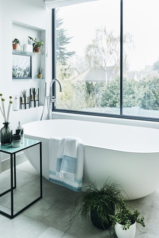 Modern bathroom with accessories by JD Williams