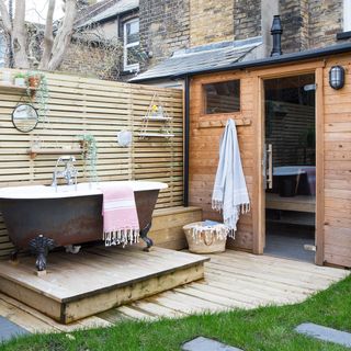 outdoor sauna and freestanding bath