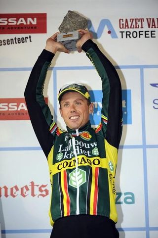 Sven Nys holds his trophy aloft.