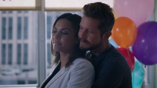 Conrad hugging Billie from behind on The Resident.