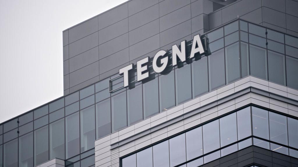 Signage is displayed outside Tegna Inc. headquarters in McLean, Virginia, U.S., on Friday, March, 13, 2020. Comedian and TV producer Byron Allen has made a $20-a-share, all-cash offer for Tegna in a deal that values the TV station owner at $8.5 billion, including debt, according to a person familiar with the situation. Photographer: Andrew Harrer/Bloomberg via Getty Images