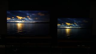 LG B3 and G3 side by side with image of sunset on screen