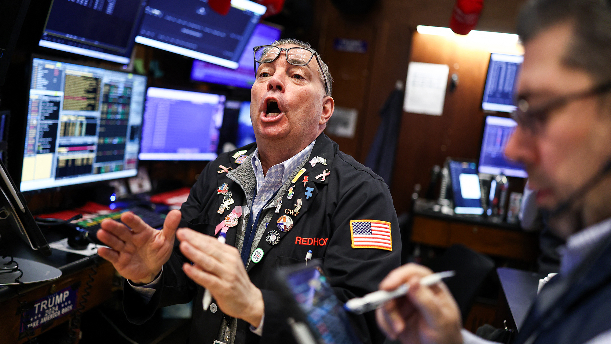 Traders work on the floor of the New York Stock Exchange after US-Israeli attacks on Iran caused a surge in oil prices