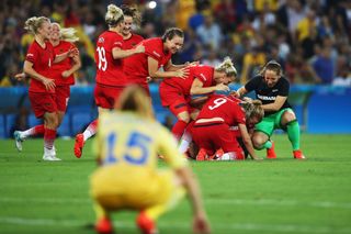 Germany players celebrate victory over Sweden in the women's football tournament at the 2016 Olympics in Rio de Janeiro.