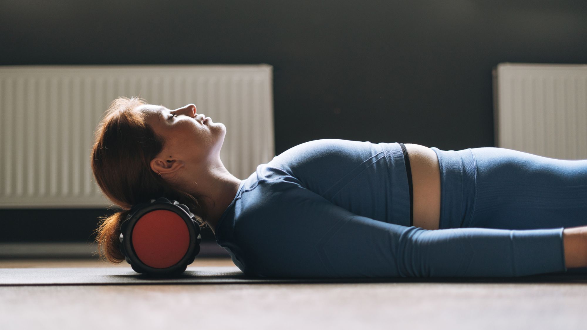 Health tracking: Woman lying on a foam roller
