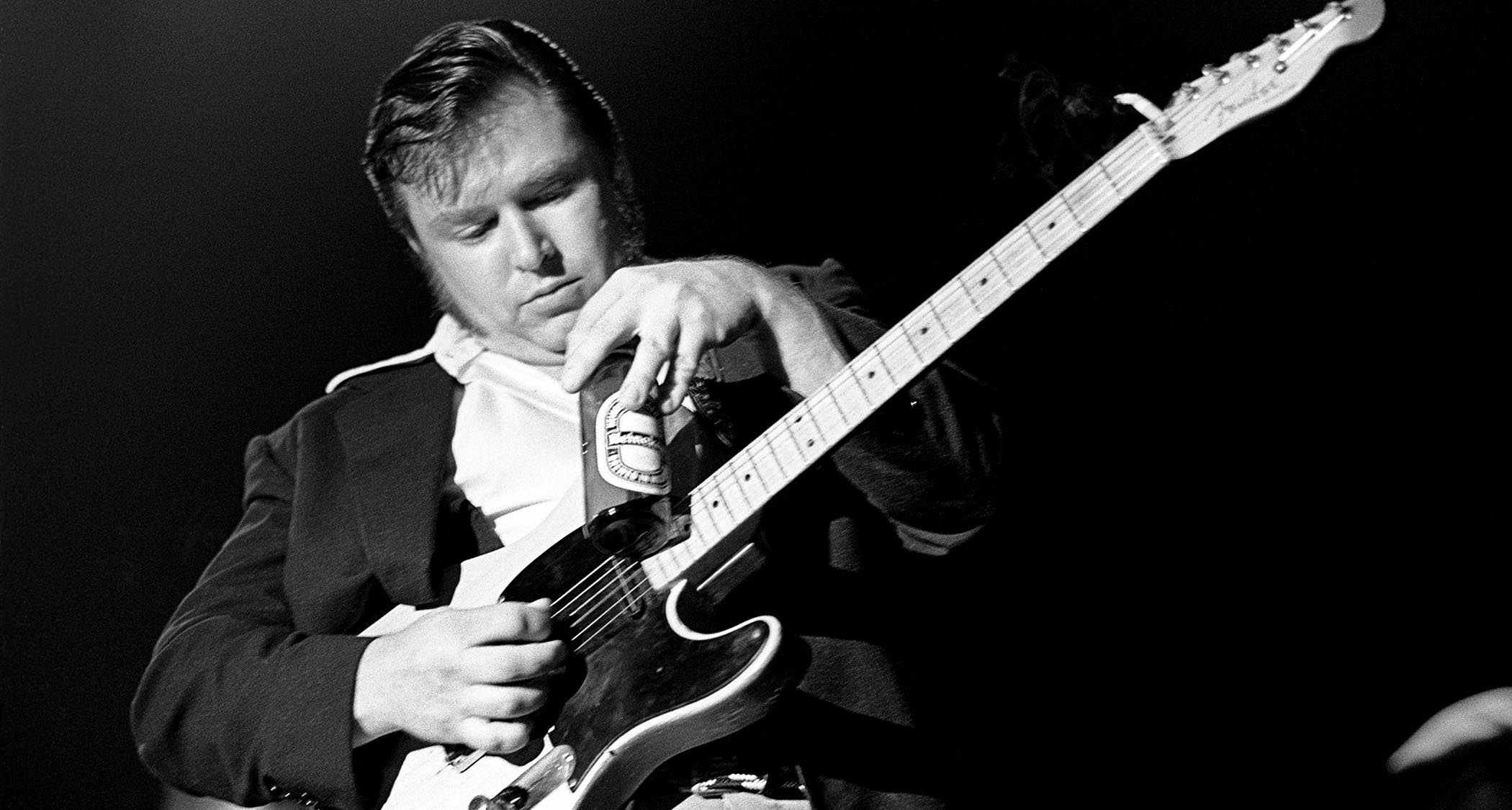 Danny Gatton plays his 1953 Fender Telecaster with a Heineken bottle.