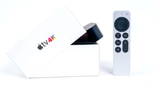Apple TV 4K in box with remote