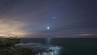 Planets Venus, Mars and Jupiter align over the Isle of Portland Dorset England in the U.K.