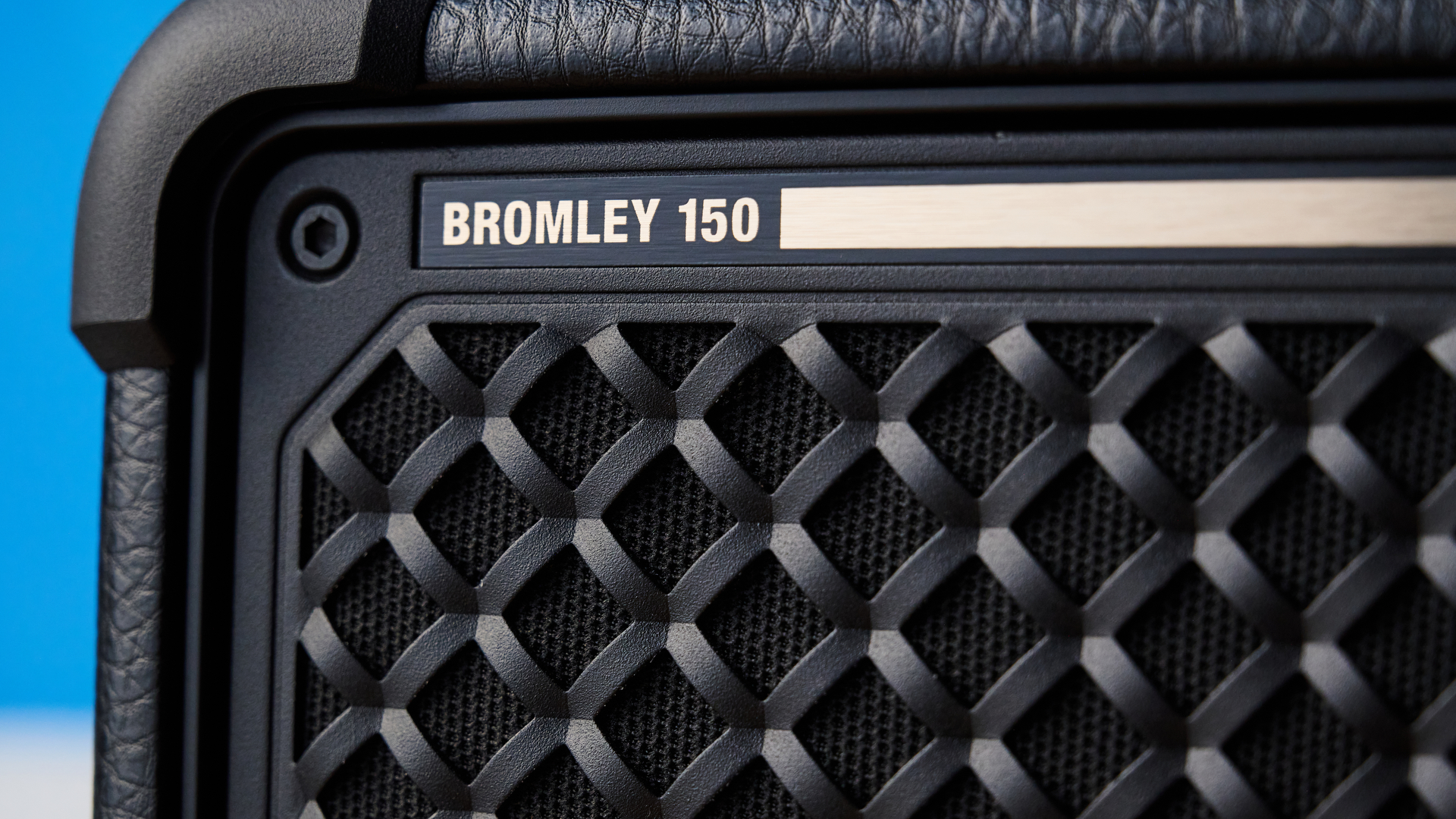 A black and brass Marshall Bromley 150 portable party speaker