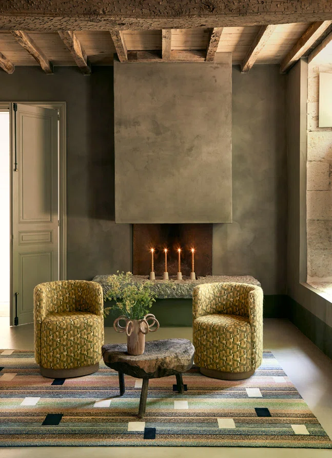Jacquard armchairs in a rustic living space