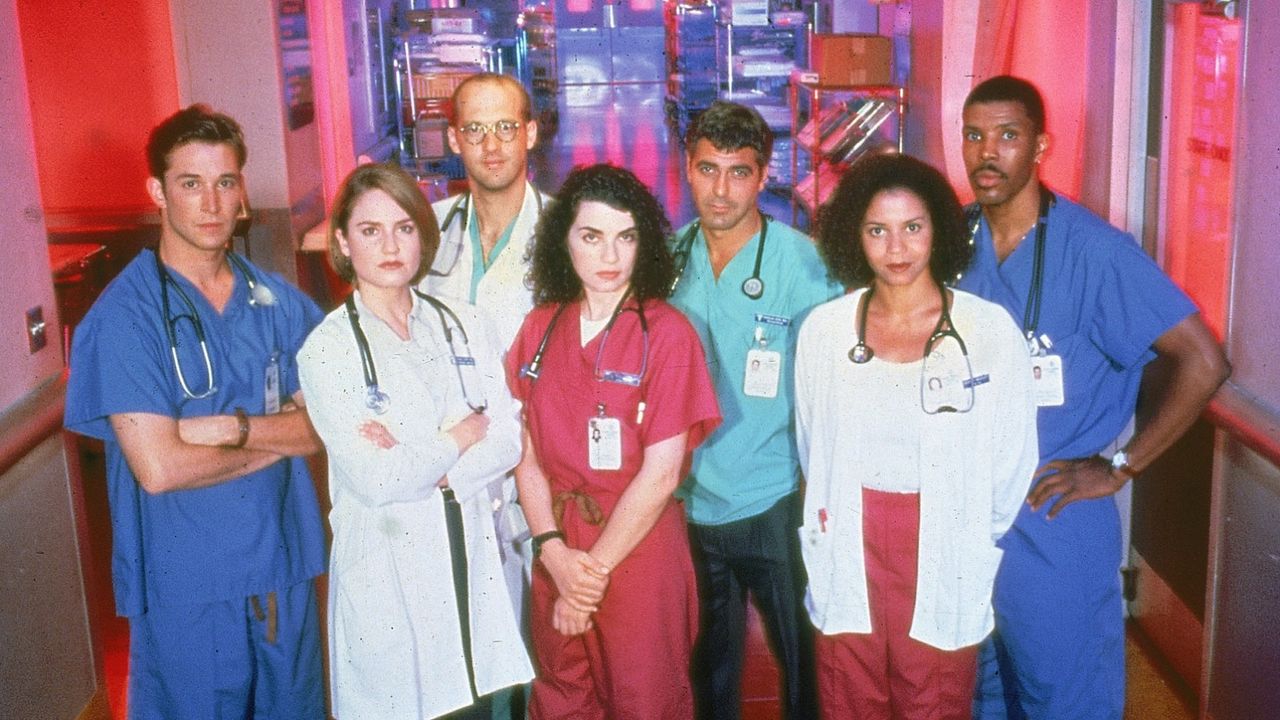 Promotional portrait of cast members from the television series, &quot;E.R.,&quot; c. 1996. L-R: Noah Wyle, Sherry Stringfield, Anthony Edwards, Julianna Margulies, George Clooney, Gloria Reuben and Eriq La Salle.