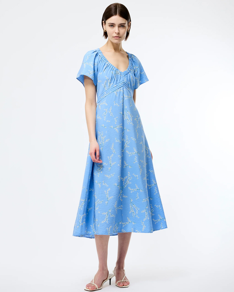 model wearing a blue floral midi dress, French Connection