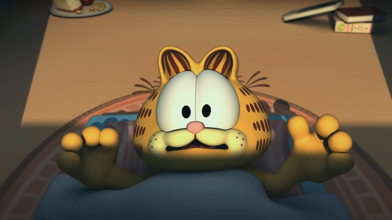 Garfield lies in bed startled by the sun in Garfield Gets Real.