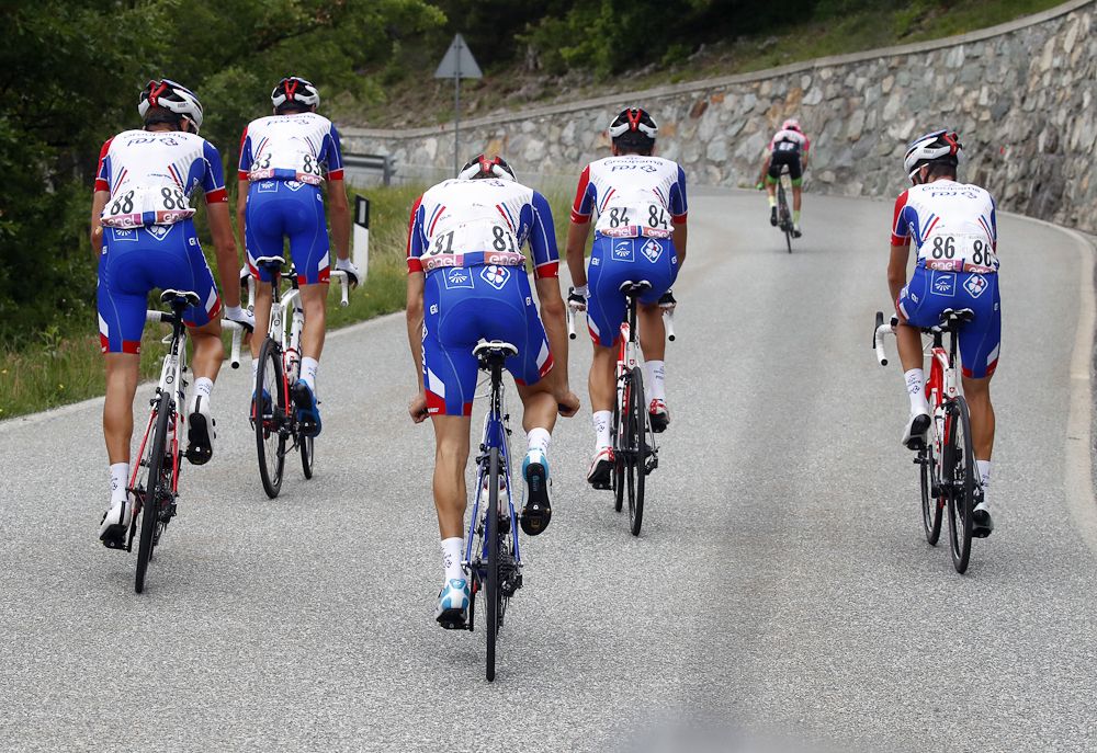 Thibaut Pinot's teammates accompany the Frenchman as he struggles during stage 20 at the Giro d'Italia
