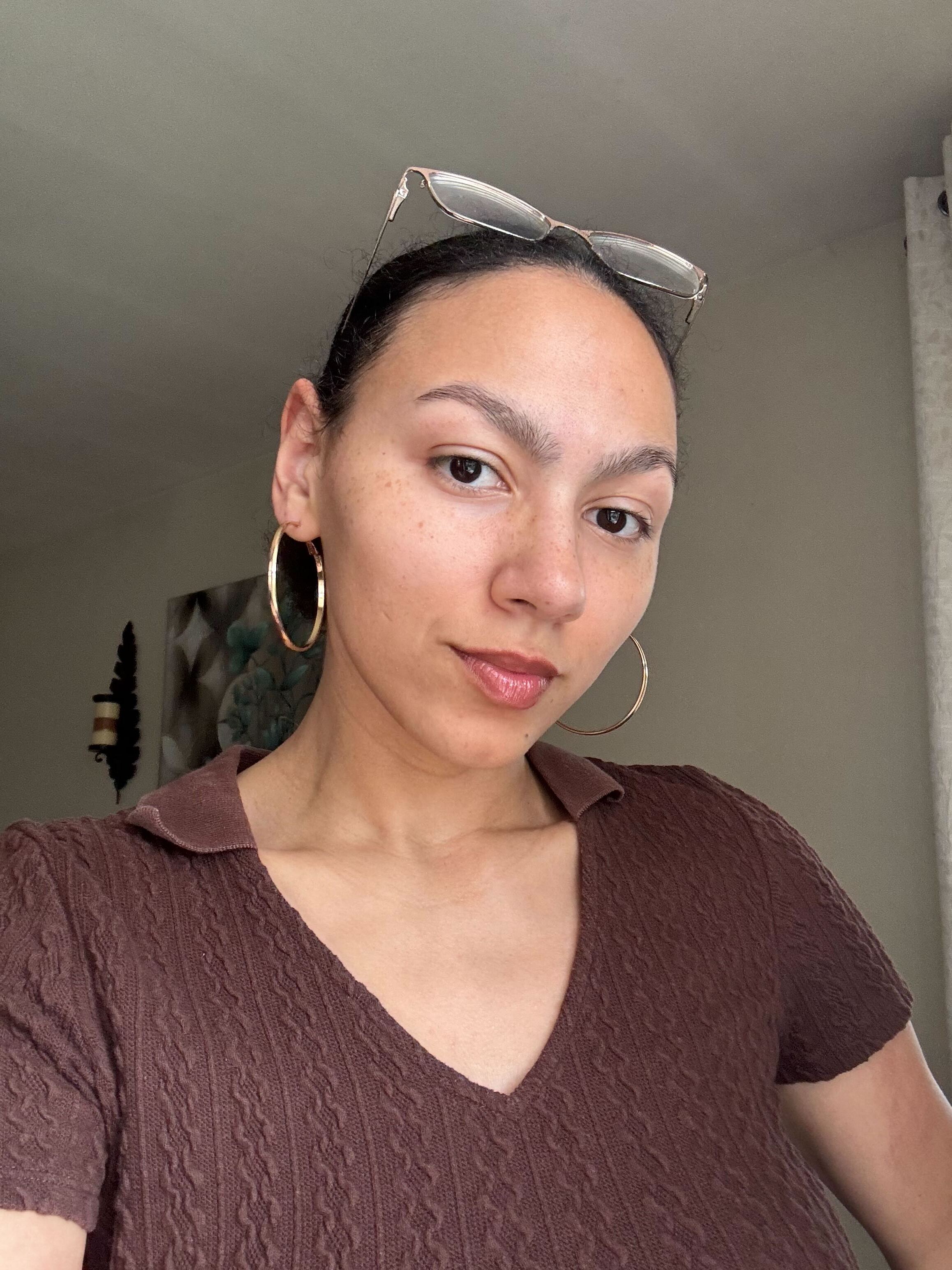 WWW assistant beauty editor Sabrina Talbert wearing Glossier Lip Line in Buff.