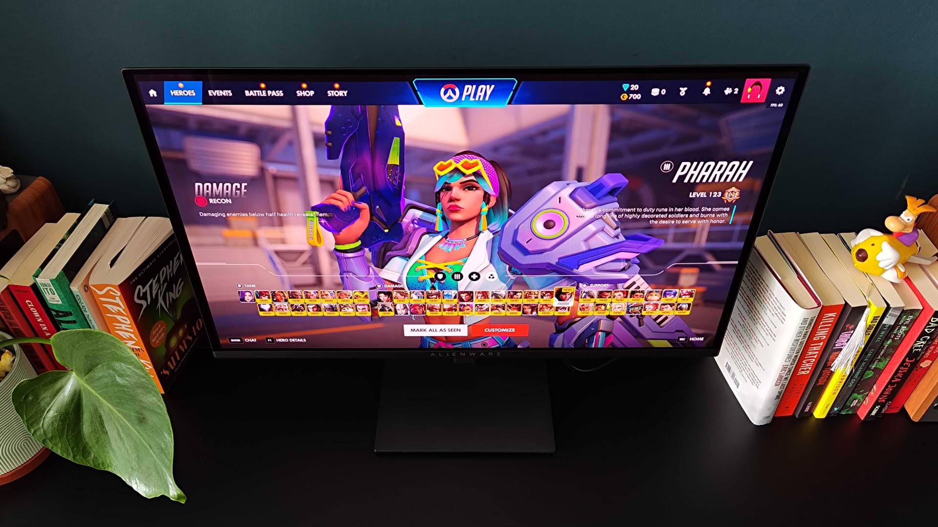 Alienware AW2726DM monitor with Overwatch character select on screen and Pharah selected.