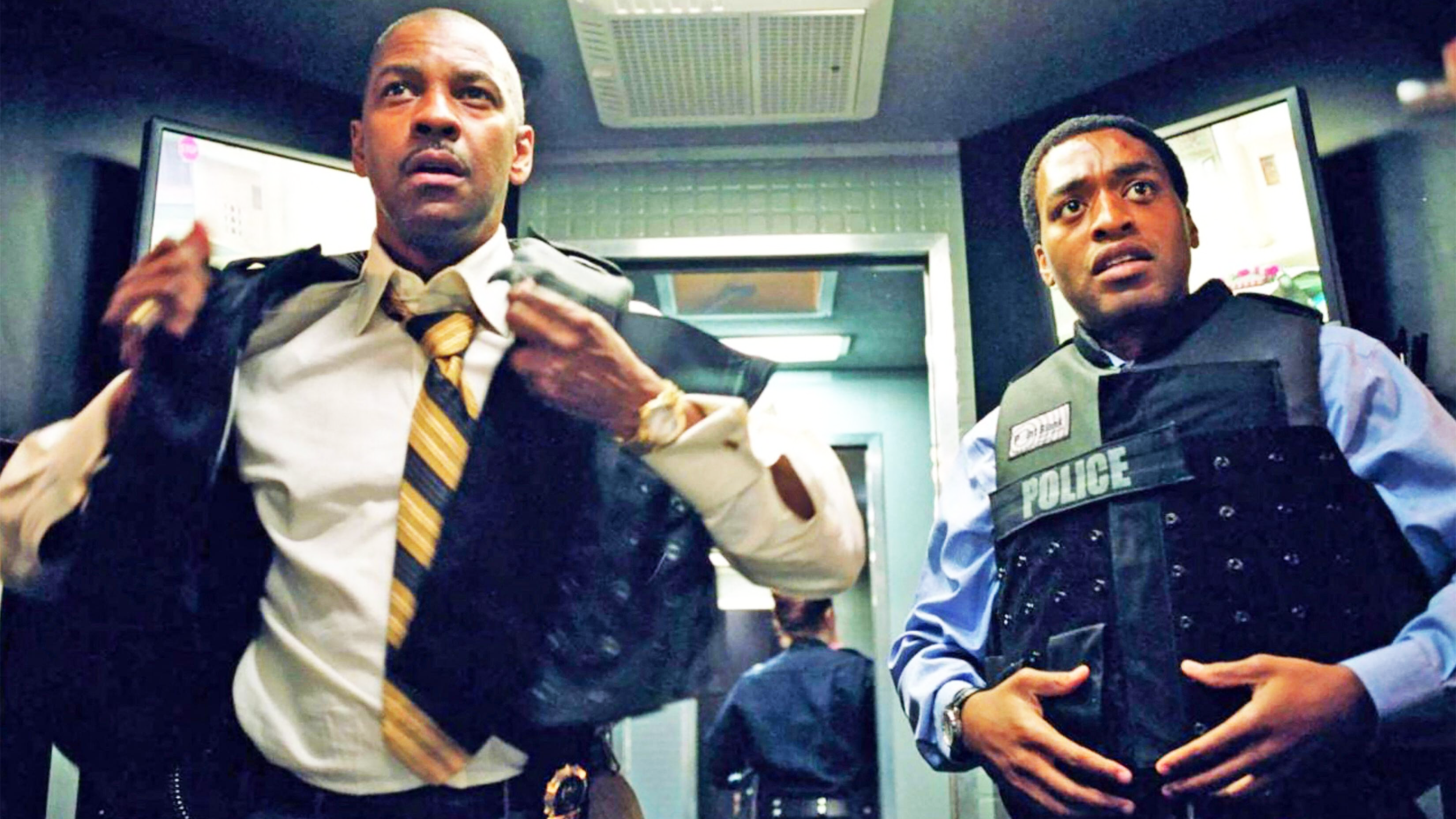 (L-R) Denzel Washington and Chiwetel Ejiofor in "Inside Man" (2006).