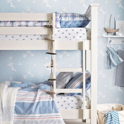 boys bedroom with bunkbeds and coastal theme